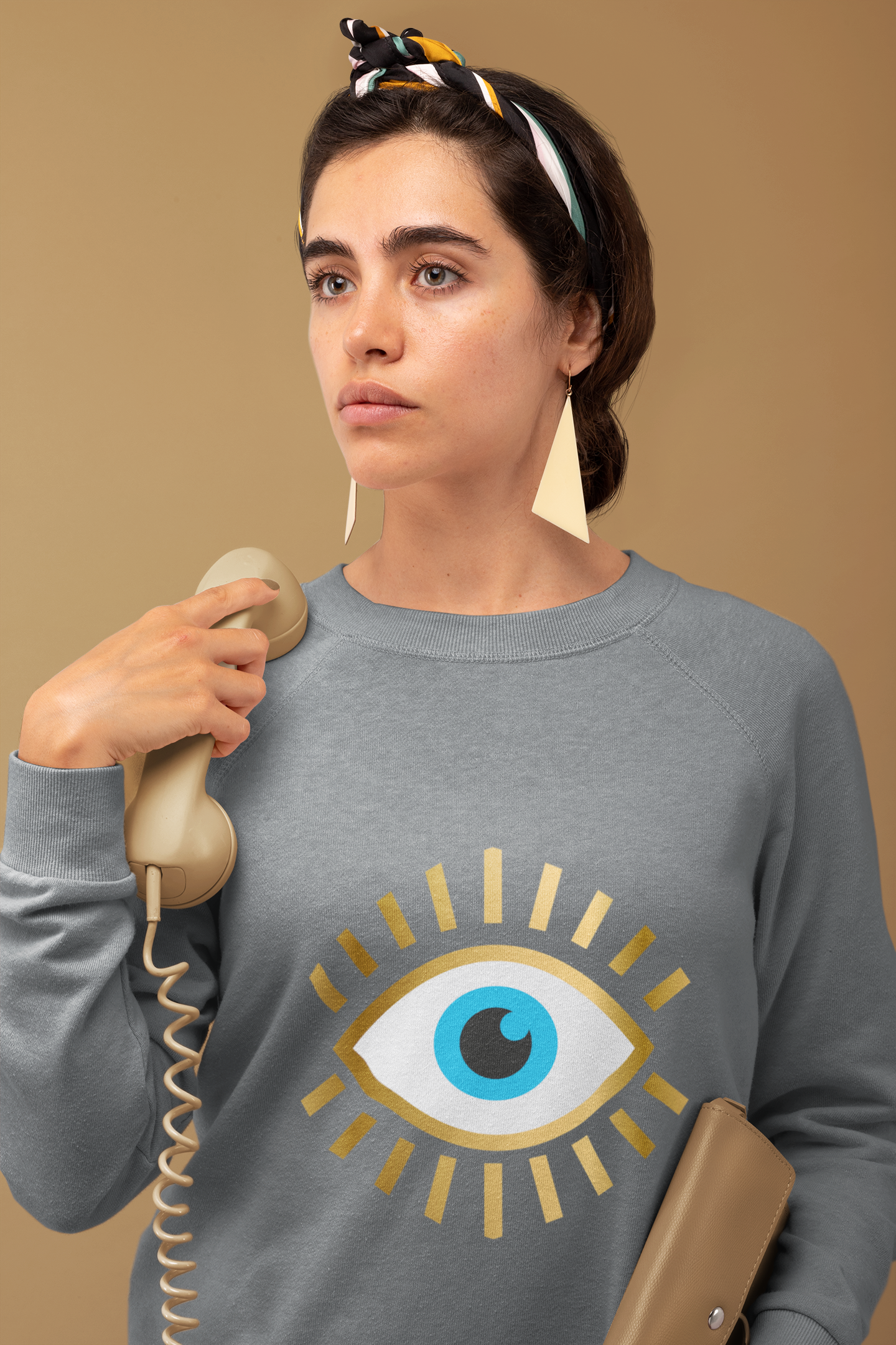 Stay Stylish and Protected with our Shimmering Evil Eye Sweatshirt