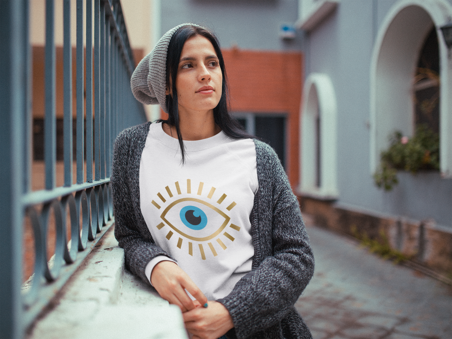 Stay Stylish and Protected with our Shimmering Evil Eye Sweatshirt